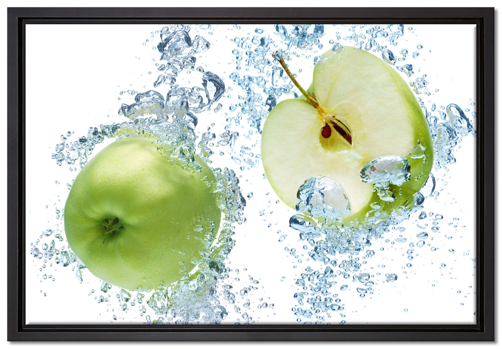 Frische Apfelscheiben im Wasser auf Leinwandbild gerahmt Größe 60x40