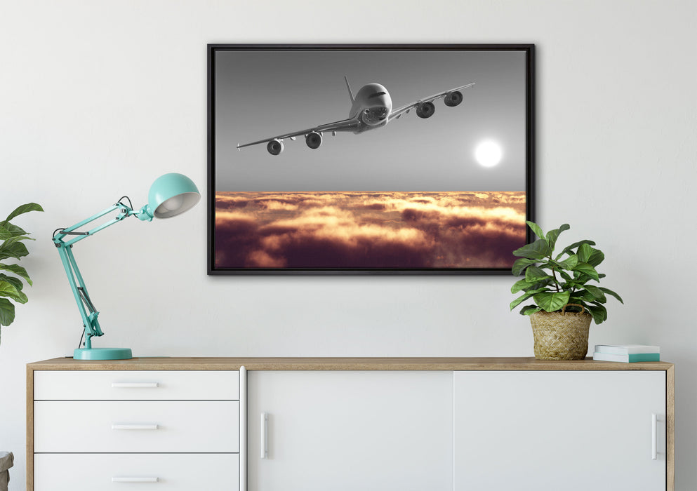 Flugzeug über Wolkenmeer auf Leinwandbild gerahmt verschiedene Größen im Wohnzimmer