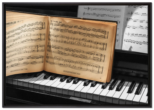 Notenbuch auf Piano auf Leinwandbild gerahmt Größe 100x70