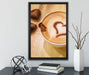 Kaffee Herz aus Schaum Cappucino auf Leinwandbild gerahmt mit Kirschblüten