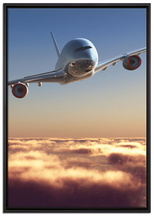 Flugzeug über den Wolken auf Leinwandbild gerahmt Größe 100x70