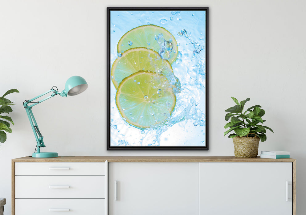Zitrone fällt ins Wasser auf Leinwandbild gerahmt verschiedene Größen im Wohnzimmer
