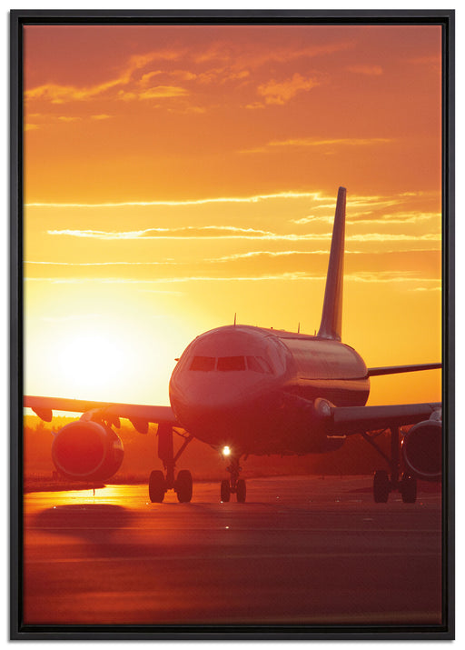 Flugzeug im Sonnenuntergang auf Leinwandbild gerahmt Größe 100x70