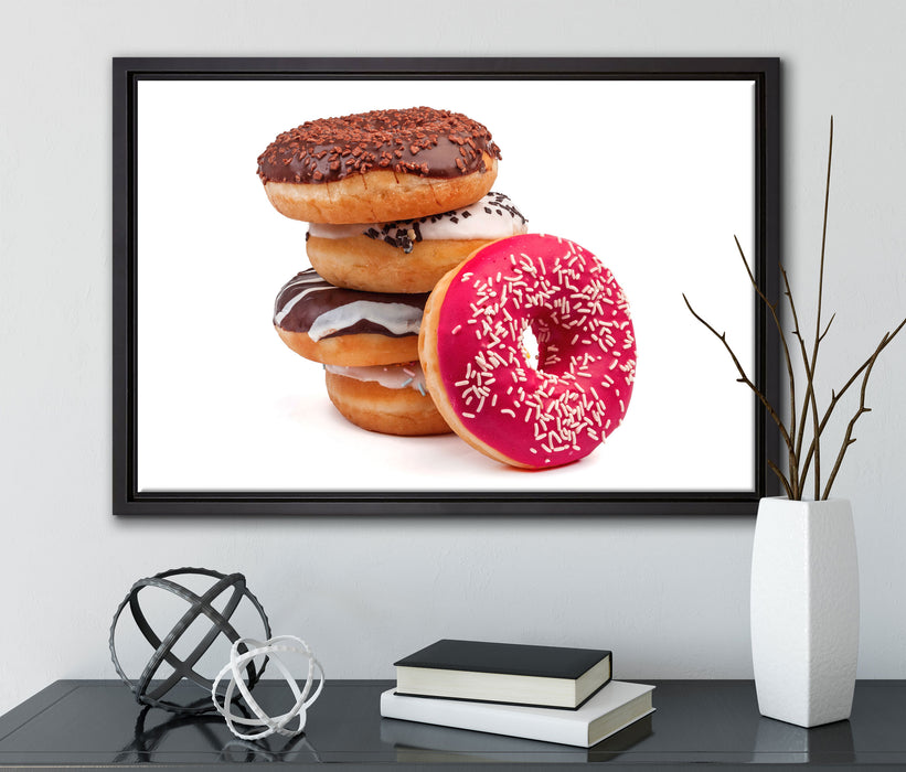 Süße Donuts auf Leinwandbild gerahmt mit Kirschblüten
