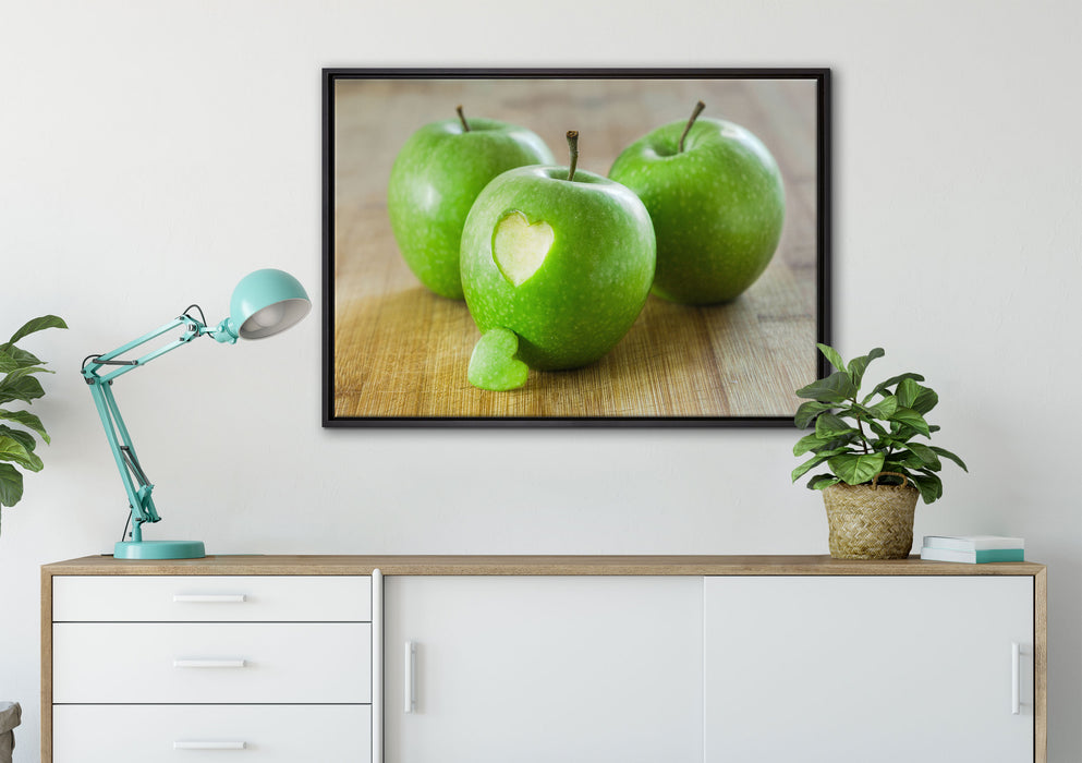 ein Herzchen im Apfel auf Leinwandbild gerahmt verschiedene Größen im Wohnzimmer