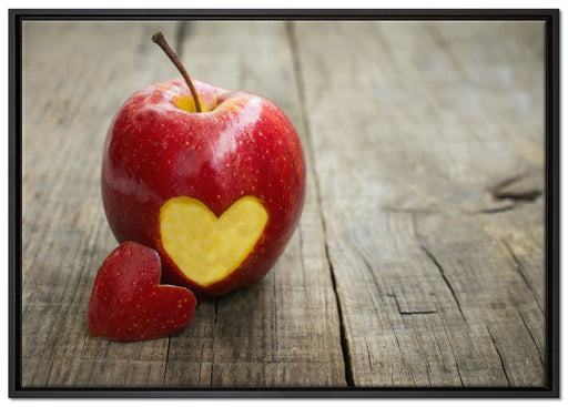 Herzschnitzerei in Apfel auf Leinwandbild gerahmt Größe 100x70