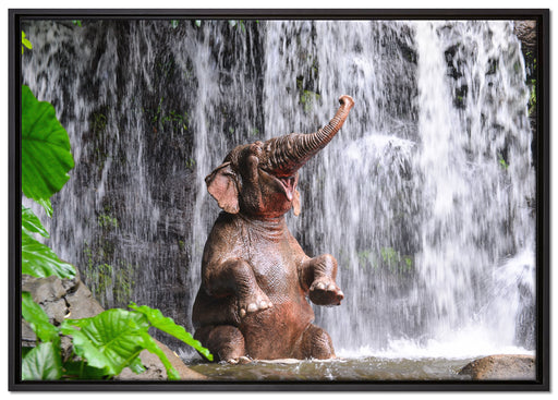 Babyelefant am Wasserfall auf Leinwandbild gerahmt Größe 100x70