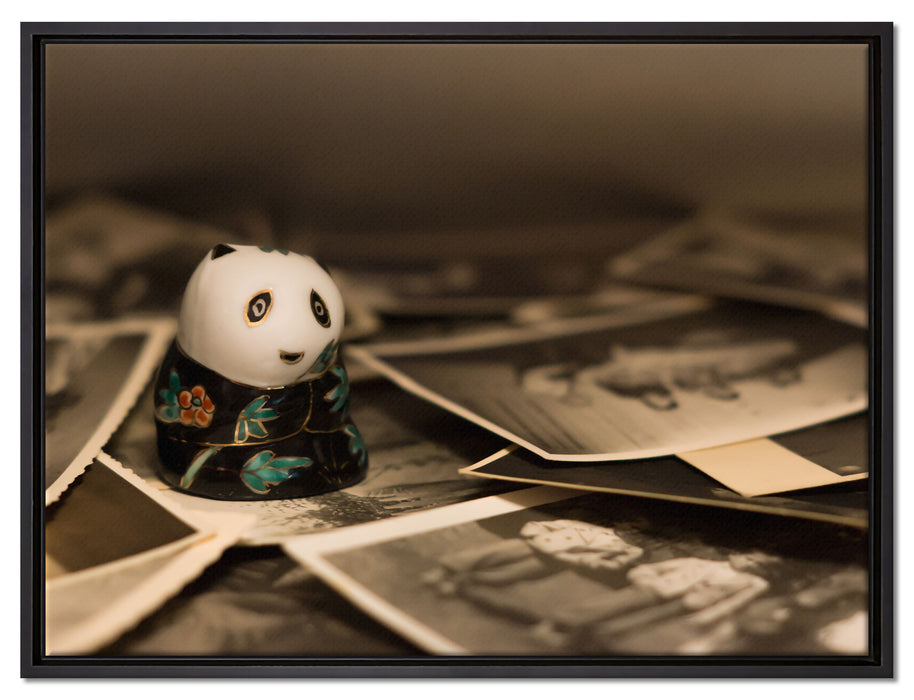 Panda Figur zwischen Fotografien auf Leinwandbild gerahmt Größe 80x60