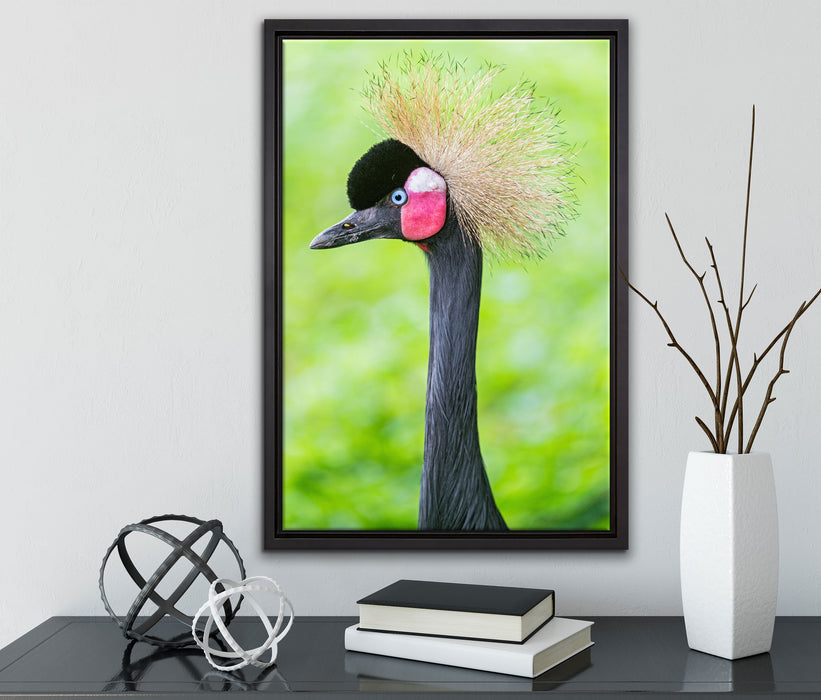 Kronenkranich im Seitenprofil auf Leinwandbild gerahmt mit Kirschblüten