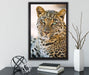 schöner Leopard auf Leinwandbild gerahmt mit Kirschblüten