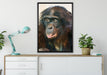 scheuer junger Gorilla auf Leinwandbild gerahmt verschiedene Größen im Wohnzimmer