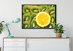 Orange verirrt in Kiwi Scheiben auf Leinwandbild gerahmt verschiedene Größen im Wohnzimmer
