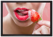 Erdbeere vor Lippen auf Leinwandbild gerahmt Größe 60x40