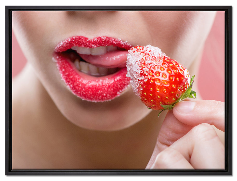 Erdbeere vor Lippen auf Leinwandbild gerahmt Größe 80x60