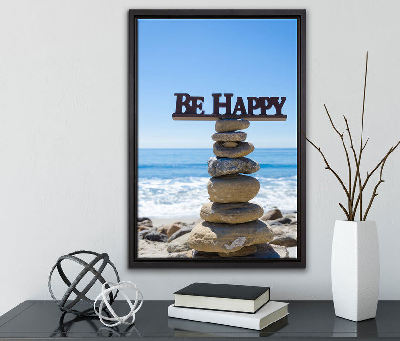 Steinturm am Strand auf Leinwandbild gerahmt mit Kirschblüten