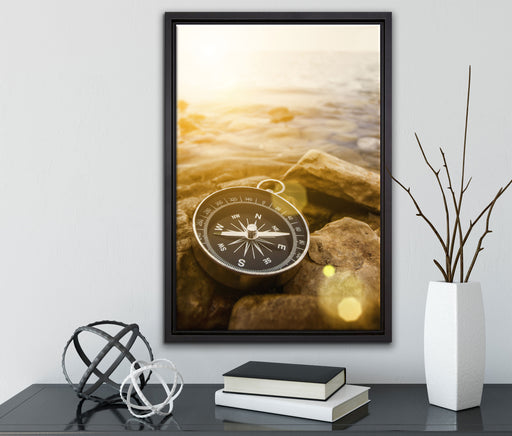 Kompass auf Steinen Reiselust auf Leinwandbild gerahmt mit Kirschblüten