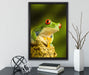 Grüner Rotaugen Frosch auf Leinwandbild gerahmt mit Kirschblüten