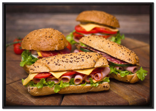 Köstliche Sandwiches auf Leinwandbild gerahmt Größe 100x70