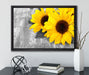 schöne Sonnenblumen auf Holztisch auf Leinwandbild gerahmt mit Kirschblüten
