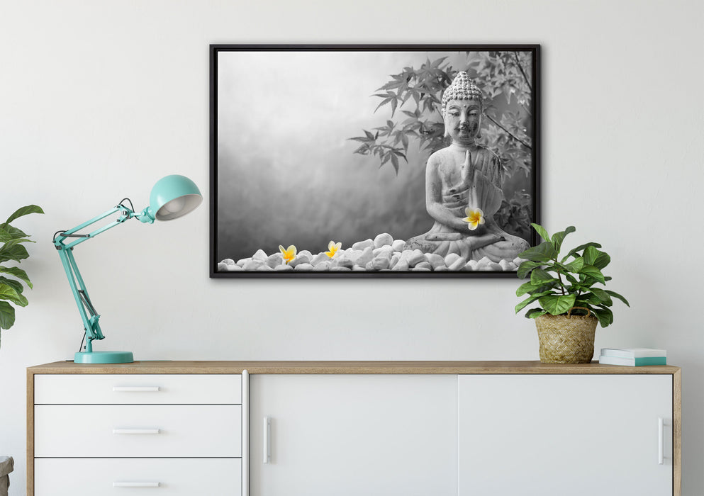 Buddha mit Monoi Blüte in der Hand auf Leinwandbild gerahmt verschiedene Größen im Wohnzimmer