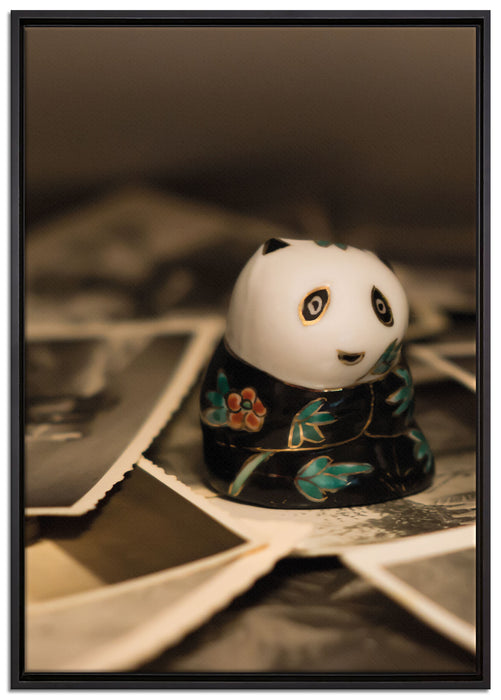 Panda Figur zwischen Fotografien auf Leinwandbild gerahmt Größe 100x70