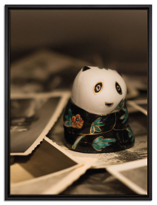 Panda Figur zwischen Fotografien auf Leinwandbild gerahmt Größe 80x60