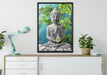 Buddha auf Steinen mit Monoi Blüte auf Leinwandbild gerahmt verschiedene Größen im Wohnzimmer