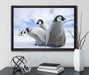 Kaiserpinguin Gruppe auf Leinwandbild gerahmt mit Kirschblüten