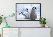Kaiserpinguin Gruppe auf Leinwandbild gerahmt verschiedene Größen im Wohnzimmer