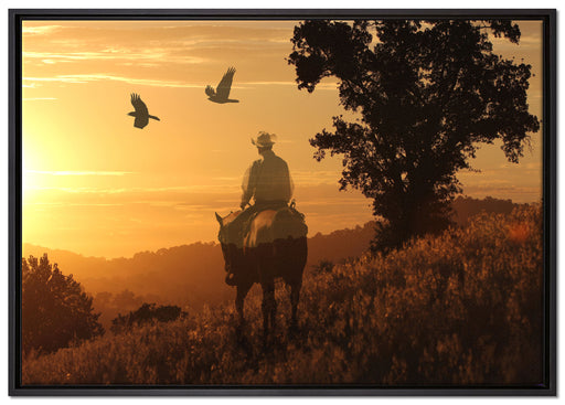Ein Cowboy im Sonnenuntergang auf Leinwandbild gerahmt Größe 100x70