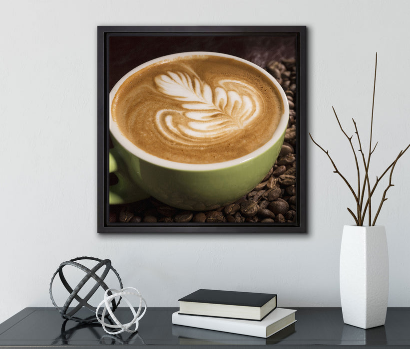 Cappucino zwischen Kaffeebohnen  auf Leinwandbild Quadratisch gerahmt mit Kirschblüten