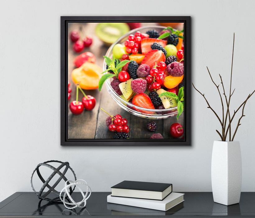 Obstsalat in der Schüssel  auf Leinwandbild Quadratisch gerahmt mit Kirschblüten