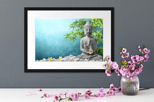 Buddha auf Steinen mit Monoi Blüte Passepartout Wohnzimmer