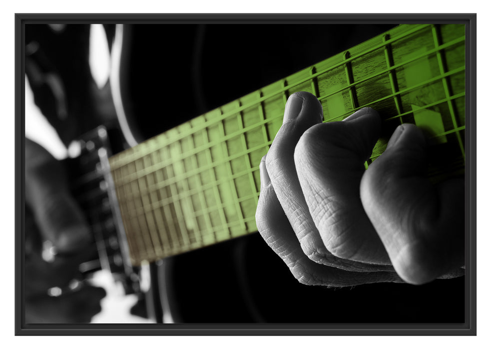 Pixxprint Mann spielt auf E-Gitarre, im Schwebe-Effekt Bilderrahmen