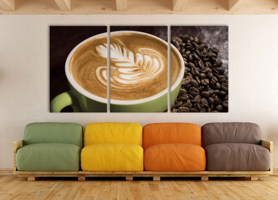 Cappucino zwischen Kaffeebohnen, XXL Leinwandbild als 3 Teiler