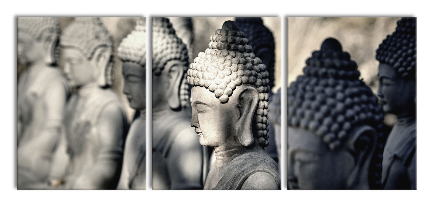Buddha-Statuen in einer Reihe, XXL Leinwandbild als 3 Teiler