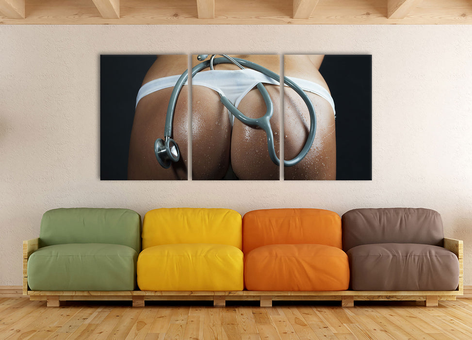 Frauenpo mit Stethoskop, XXL Leinwandbild als 3 Teiler