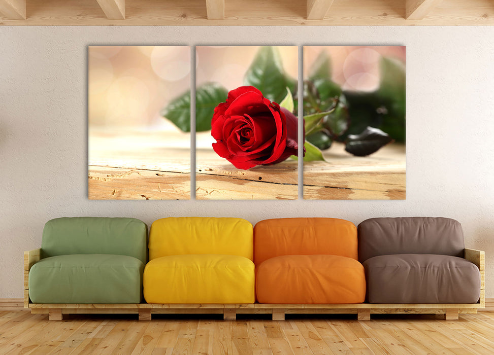 Rose auf Holztisch, XXL Leinwandbild als 3 Teiler